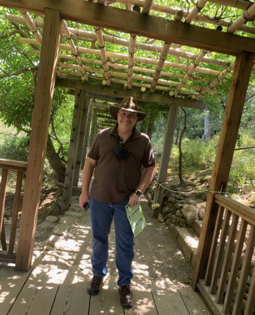 Michael in the wisteria arbor at Hakone Gardens